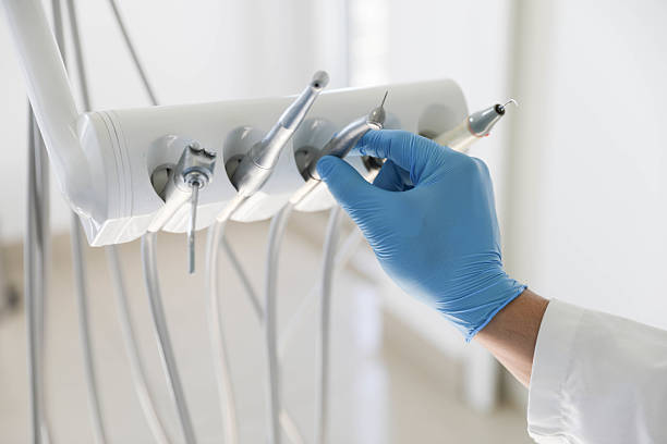 Professional Emergency Dentist technician working in Littleton Common, MA